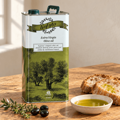 Liofyto extra virgin olive oil 4L tin on a kitchen table with bread, black olives and a bowl of olive oil