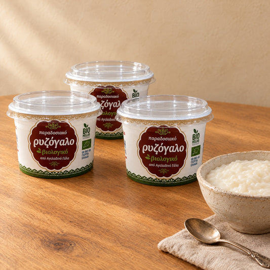Three cups of Gaitanidis organic rizogalo with the EU organic logo, next to a small bowl of rizogalo
