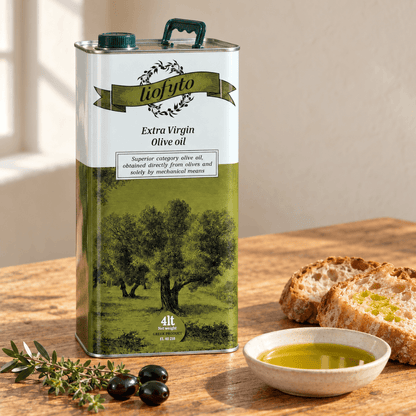 Liofyto extra virgin olive oil 4L tin on a kitchen table with bread, black olives and a bowl of olive oil