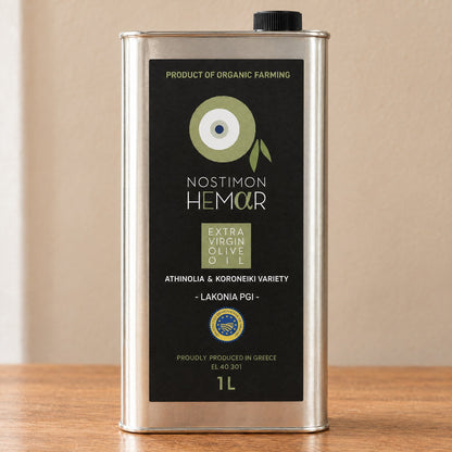 Front of the Nostimon Hemar tin: organic farming, Athinolia and Koroneiki varieties, PGI Lakonia