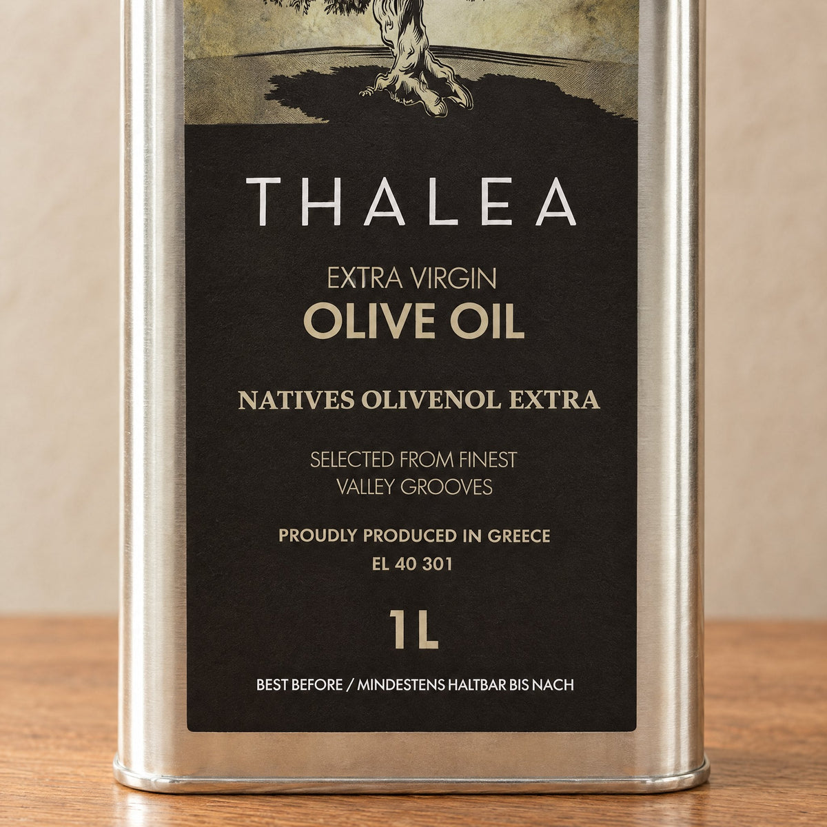 Front label of the Thalea 1L tin: extra virgin olive oil from the valley floor